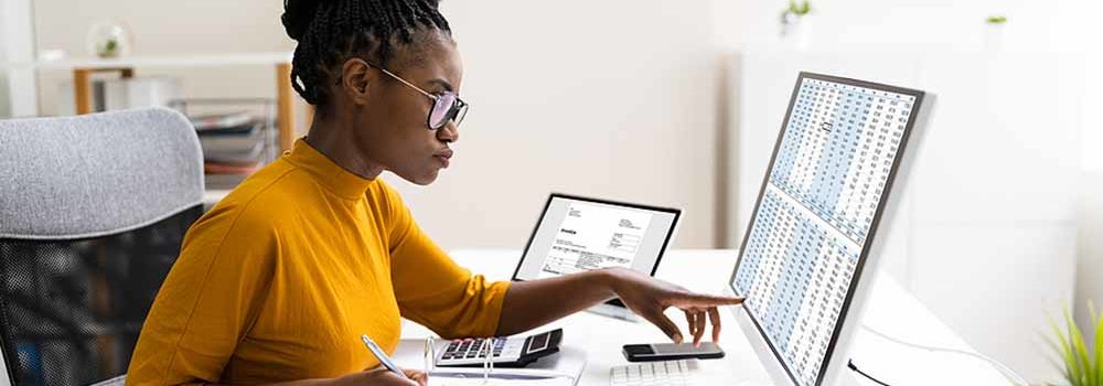 African American woman preparing taxes