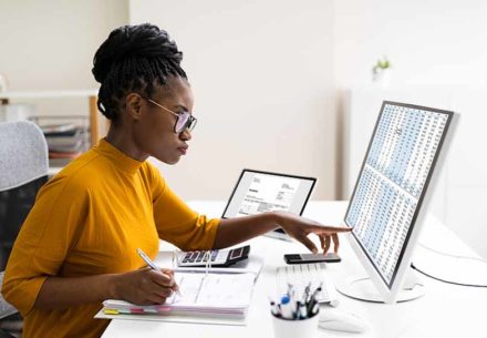 African American woman preparing taxes