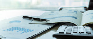 business reports and a calculator.