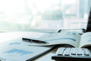 business reports and a calculator.