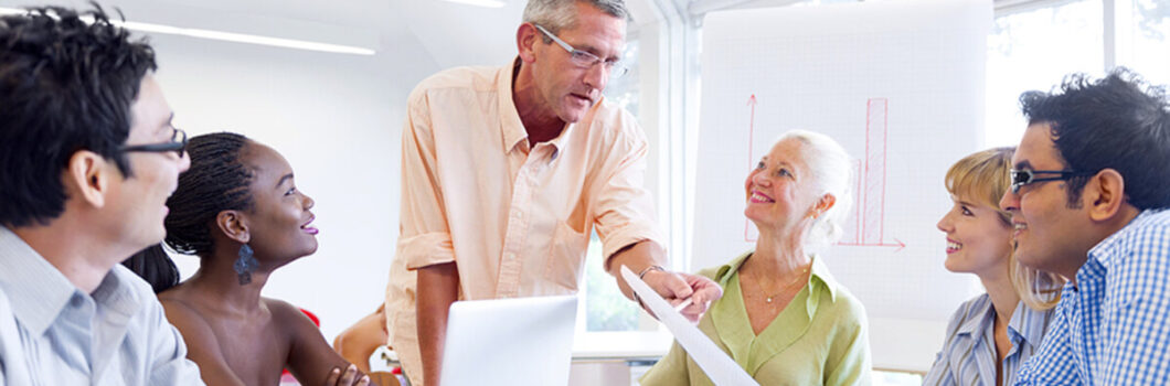 a group of people receiving financial mentoring.