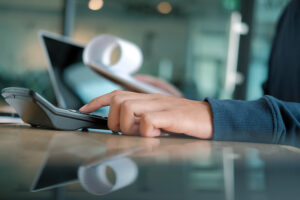 a person paying bills at work.