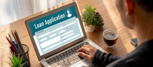 a person applies for a business loan online.