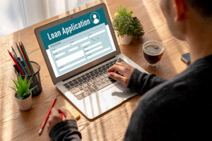 a person applies for a business loan online.