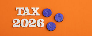 the words tax 2026 over an orange background.