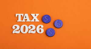 the words tax 2026 over an orange background.