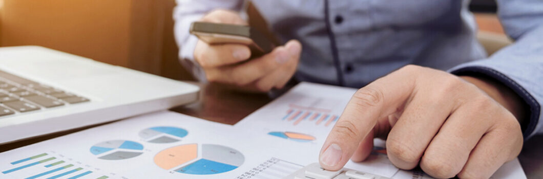 A person works on tax projections.