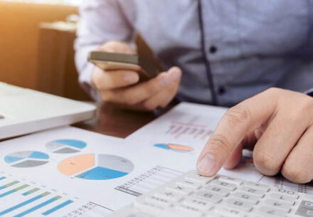 A person works on tax projections.