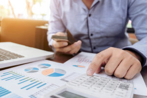 A person works on tax projections.