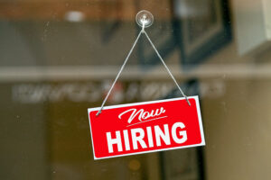 A now hiring sign.