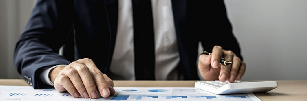 a financial professional reviewing figures.