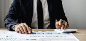 a financial professional reviewing figures.