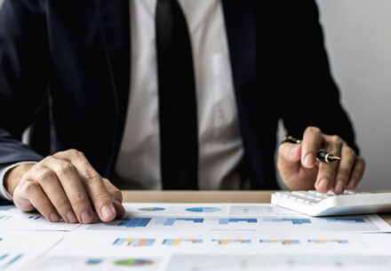 a financial professional reviewing figures.