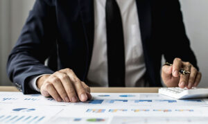 a financial professional reviewing figures.