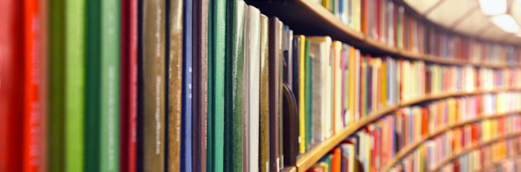 curving library shelves full of books.